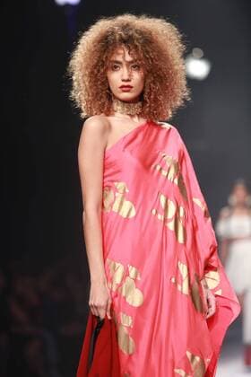 NEW DELHI, INDIA - OCTOBER 15: A model showcases the creation of designer Masaba Gupta during Amazon India Fashion Week Spring-Summer 17 at NSIC Exhibition Complex on October 15, 2016 in New Delhi, India. (Photo by Amal Ks Hindustan Times) Amazon India Fashion Week Spring Summer 2017