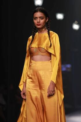 NEW DELHI, INDIA - OCTOBER 15: A model showcases the creation of designer Masaba Gupta during Amazon India Fashion Week Spring-Summer 17 at NSIC Exhibition Complex on October 15, 2016 in New Delhi, India. (Photo by Amal Ks Hindustan Times) Amazon India Fashion Week Spring Summer 2017