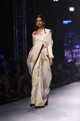 NEW DELHI, INDIA - OCTOBER 15: A model showcases the creation of designer Masaba Gupta during Amazon India Fashion Week Spring-Summer 17 at NSIC Exhibition Complex on October 15, 2016 in New Delhi, India. (Photo by Amal Ks Hindustan Times) Amazon India Fashion Week Spring Summer 2017