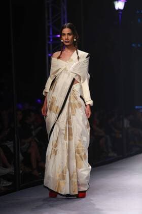 NEW DELHI, INDIA - OCTOBER 15: A model showcases the creation of designer Masaba Gupta during Amazon India Fashion Week Spring-Summer 17 at NSIC Exhibition Complex on October 15, 2016 in New Delhi, India. (Photo by Amal Ks Hindustan Times) Amazon India Fashion Week Spring Summer 2017