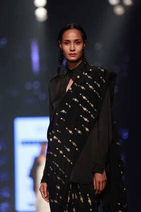 NEW DELHI, INDIA - OCTOBER 15: A model showcases the creation of designer Masaba Gupta during Amazon India Fashion Week Spring-Summer 17 at NSIC Exhibition Complex on October 15, 2016 in New Delhi, India. (Photo by Amal Ks Hindustan Times) Amazon India Fashion Week Spring Summer 2017