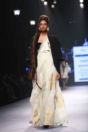 NEW DELHI, INDIA - OCTOBER 15: A model showcases the creation of designer Masaba Gupta during Amazon India Fashion Week Spring-Summer 17 at NSIC Exhibition Complex on October 15, 2016 in New Delhi, India. (Photo by Amal Ks Hindustan Times) Amazon India Fashion Week Spring Summer 2017