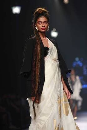 NEW DELHI, INDIA - OCTOBER 15: A model showcases the creation of designer Masaba Gupta during Amazon India Fashion Week Spring-Summer 17 at NSIC Exhibition Complex on October 15, 2016 in New Delhi, India. (Photo by Amal Ks Hindustan Times) Amazon India Fashion Week Spring Summer 2017