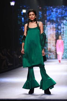 NEW DELHI, INDIA - OCTOBER 15: A model showcases the creation of designer Masaba Gupta during Amazon India Fashion Week Spring-Summer 17 at NSIC Exhibition Complex on October 15, 2016 in New Delhi, India. (Photo by Amal Ks Hindustan Times) Amazon India Fashion Week Spring Summer 2017