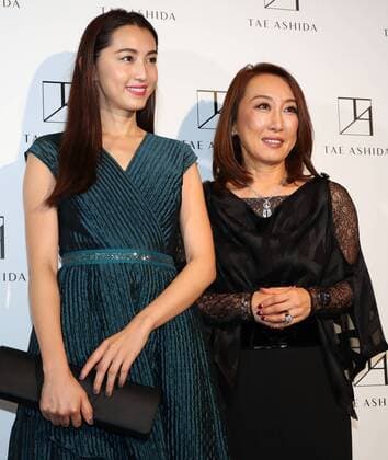 October 17, 2016, Tokyo, Japan - Japanese actress Miki Arimura (L) smiles with Japanese designer Tae Ashida at her spring and summer collection in Tokyo as a part of Japan Fashion Week on Monday, October 17, 2016. Tae Ashida celebrated her 25th anniversary collection.  (lwxa005459)