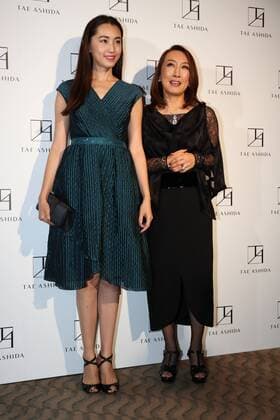 October 17, 2016, Tokyo, Japan - Japanese actress Miki Arimura (L) smiles with Japanese designer Tae Ashida at her spring and summer collection in Tokyo as a part of Japan Fashion Week on Monday, October 17, 2016. Tae Ashida celebrated her 25th anniversary collection.  (lwxa005462)