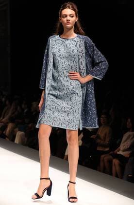 October 18, 2016, Tokyo, Japan - A model displays a creation of Japanese designer Yuki Torii at her 2017 spring summer collection in Tokyo as a part of Japan Fashion Week on Tuesday, October 18, 2016.  (lwxa005503)