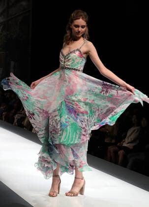 October 18, 2016, Tokyo, Japan - A model displays a creation of Japanese designer Yuki Torii at her 2017 spring summer collection in Tokyo as a part of Japan Fashion Week on Tuesday, October 18, 2016.  (lwxa005510)