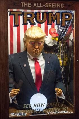 A fortune-telling fairground attraction representing Republican presidential candidate Donald Trump appears outside a New York theater screening the premiere of the documentary Michael Moore In TrumpLand on October 18, 2016. Filmmaker Michael Moore had finished editing the film the previous day and made a surprise last-minute announcement on Twitter that he would show it for free today. The film will play for a week in Los Angeles and New York starting tomorrow. Photo by Enrique Shore Cordon Press  ENRIQUExSHORE A robot of Trump sits outside the premiere of documentary MIcha