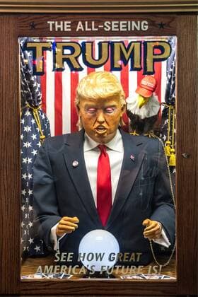 A fortune-telling fairground attraction representing Republican presidential candidate Donald Trump appears outside a New York theater screening the premiere of the documentary Michael Moore In TrumpLand on October 18, 2016. Filmmaker Michael Moore had finished editing the film the previous day and made a surprise last-minute announcement on Twitter that he would show it for free today. The film will play for a week in Los Angeles and New York starting tomorrow. Photo by Enrique Shore Cordon Press  ENRIQUExSHORE A robot of Trump sits outside the premiere of documentary MIcha