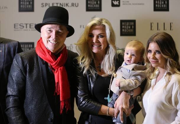 MOSCOW, RUSSIA - OCTOBER 18, 2016: Russian designer Slava Zaitsev, Valentin Yudashkin s wife Marina, and Valentin Yudashkin s daughter Galina (L-R) with her son Anatoly at the opening of the 35th Season of Moscow Fashion Week, in Moscow s Gostiny Dvor Shopping and Exhibition Centre. Dmitry Serebryakov TASS  TS034D6B