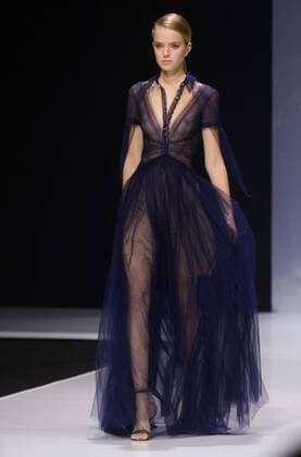 MOSCOW, RUSSIA - OCTOBER 18, 2016: A model showcases a creation during a runway show for the Spring Summer 2017 collection by designer Valentin Yudashkin at the 2016 Moscow Fashion Week, in Moscow s Gostiny Dvor Shopping and Exhibition Centre. Dmitry Serebryakov TASS  TS034D9C