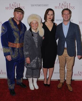 October 18, 2016 - Los Angeles, CA, United States - 17 October 2016 - Los Angeles, California. Nurgaiv, Aisolpan, Daisy Ridley, Otto Bell. Premiere Of Sony Pictures Classics The Eagle Huntress held at Pacific Theaters at The Grove. Photo Credit: AdMedia Los Angeles United States - ZUMAa123 20161018_zaa_a123_024