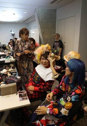 October 19, 2016, Tokyo, Japan - Japanese transgender actress Ai Haruna (C) chats with designer Takafumi Tsuruta as they prepare for the tenbo 2017 spring summer collection as a part of Japan Fashion Week in Tokyo on Wednesday, October 19, 2016.  (lwxa005549)