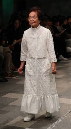 October 19, 2016, Tokyo, Japan - Former reprosy patient Miyo Maki displays a creation of Japanese designer Takafumi Tsuruta at the tenbo 2017 spring summer collection as a part of Japan Fashion Week in Tokyo on Wednesday, October 19, 2016.  (lwxa005576)