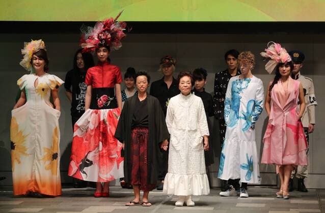 October 19, 2016, Tokyo, Japan - Former reprosy patient Miyo Maki (C, white) and models display creations of Japanese designer Takafumi Tsuruta at the tenbo 2017 spring summer collection as a part of Japan Fashion Week in Tokyo on Wednesday, October 19, 2016.  (lwxa005577)