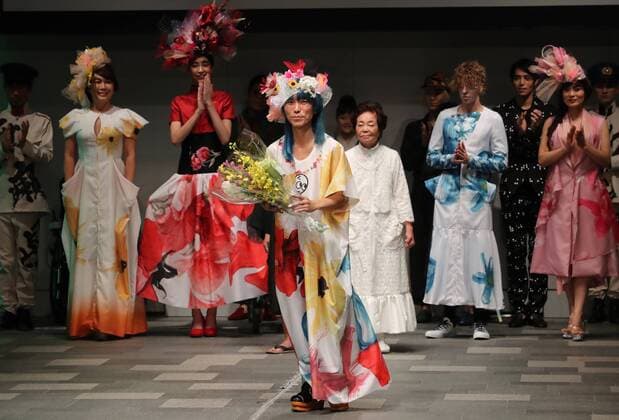 October 19, 2016, Tokyo, Japan - Japanese designer Takafumi Tsuruta (C) reacts to audience at the tenbo 2017 spring summer collection as a part of Japan Fashion Week in Tokyo on Wednesday, October 19, 2016.  (lwxa005578)