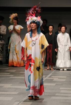 October 19, 2016, Tokyo, Japan - Japanese designer Takafumi Tsuruta reacts to audience at the tenbo 2017 spring summer collection as a part of Japan Fashion Week in Tokyo on Wednesday, October 19, 2016.  (lwxa005580)