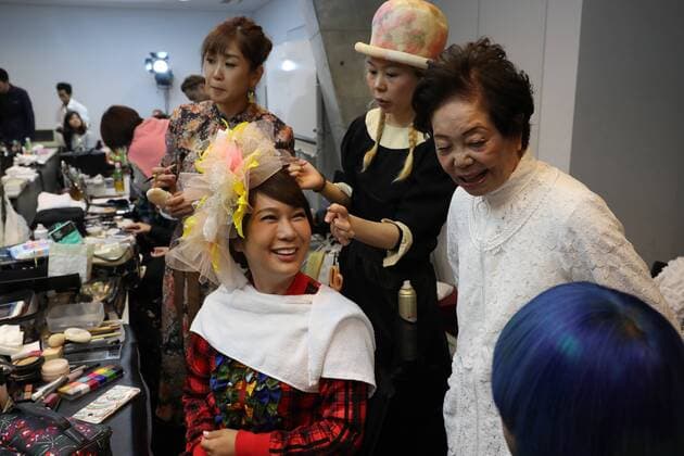 October 19, 2016, Tokyo, Japan - Former leprosy patient Miyo Maki (2nd R) smiles with designer Takafumi Tsuruta (R) and transgender actress Ai Haruna as they prepare for the tenbo 2017 spring summer collection as a part of Japan Fashion Week in Tokyo on Wednesday, October 19, 2016.  (lwxa005583)
