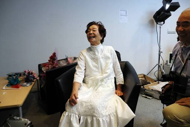 October 19, 2016, Tokyo, Japan - Former leprosy patient Miyo Maki smiles as she prepares for the tenbo 2017 spring summer collection, designed by Takafumi Tsuruta as a part of Japan Fashion Week in Tokyo on Wednesday, October 19, 2016.  (lwxa005584)