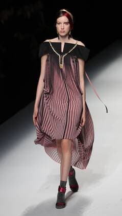 October 21, 2016, Tokyo, Japan - A model displays a creation of Japanese designer Yuma Koshino at her 2017 spring summer collection in Tokyo as a part of Japan Fashion Week on Friday, October 21, 2016.  (lwxa005638)