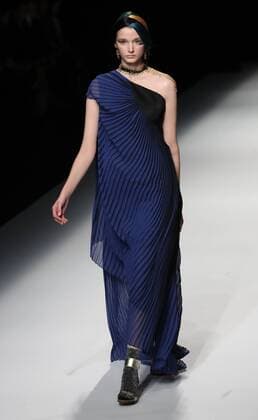 October 21, 2016, Tokyo, Japan - A model displays a creation of Japanese designer Yuma Koshino at her 2017 spring summer collection in Tokyo as a part of Japan Fashion Week on Friday, October 21, 2016.  (lwxa005643)