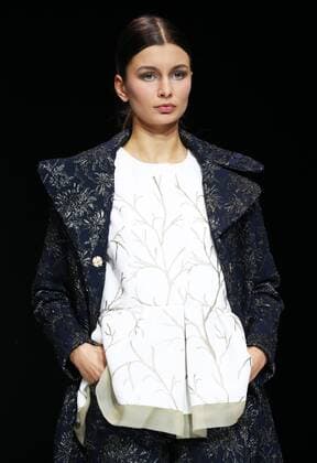 MOSCOW, RUSSIA - OCTOBER 21, 2016: A model showcases creations during a a runway show for the Spring Summer 2017 collection by Russian fashion designer Alina Assi at the 2016 Moscow Fashion Week, in Moscow s Gostiny Dvor Shopping and Exhibition Centre. Artyom Geodakyan TASS  TS0352D6