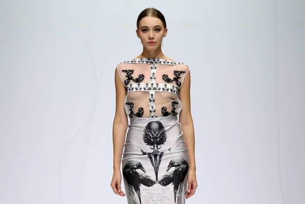 MOSCOW, RUSSIA - OCTOBER 21, 2016: A model showcases creations during a a runway show for the Spring Summer 2017 collection by Russian fashion designer Alina Assi at the 2016 Moscow Fashion Week, in Moscow s Gostiny Dvor Shopping and Exhibition Centre. Artyom Geodakyan TASS  TS0352D7
