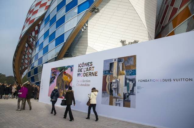 PARIS, FRANCE - OCTOBER 22, 2016: A poster outside the building of the Louis Vuitton Foundation, which has opened the Icons of Modern Art. The Shchukin Collection exhibition in collaboration with the Hermitage Museum and the Pushkin State Museum of Fine Arts. The show pays tribute to Sergei Shchukin, a Russian collector of French modern art. The exhibition is part of the 2016 17 France-Russia year of cultural tourism and is to take place at the Louis Vuitton Foundation from October 22, 2016, to February 20, 2017. Dominique Boutin TASS  TS035394