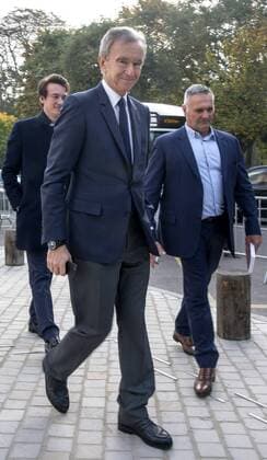 PARIS, FRANCE - OCTOBER 22, 2016: Bernard Arnault (front), the Louis Vuitton Foundation General Director, outside the building of the Louis Vuitton Foundation, which has opened the Icons of Modern Art. The Shchukin Collection exhibition in collaboration with the Hermitage Museum and the Pushkin State Museum of Fine Arts. The show pays tribute to Sergei Shchukin, a Russian collector of French modern art. The exhibition is part of the 2016 17 France-Russia year of cultural tourism and is to take place at the Louis Vuitton Foundation from October 22, 2016, to February 20, 2017. Dominique Boutin TASS  TS035396