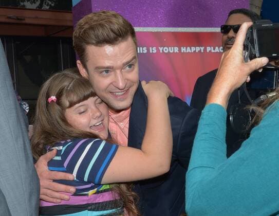 Cast member Justin Timberlake, the voice of Branch in the animated motion picture comedy Trolls is embraced by Morgan Bertsch during the premiere of the film at the Regency Village Theater in the Westwood section of Los Angeles on October 23, 2016. Storyline: A troll princess and her companion, the one unhappy troll try to rescue her friends from being eaten by their nemeses.  LAP2016102317 JIMxRUYMEN