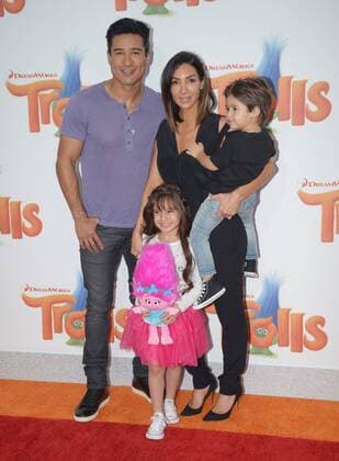 TV personality Mario Lopez and his wife Courtney Laine Mazza attend with their children Gia Lopez and Dominic Lopez the premiere of the animated motion picture comedy Trolls at the Regency Village Theater in the Westwood section of Los Angeles on October 23, 2016. Storyline: A troll princess and her companion, the one unhappy troll try to rescue her friends from being eaten by their nemeses.  LAP2016102318 JIMxRUYMEN