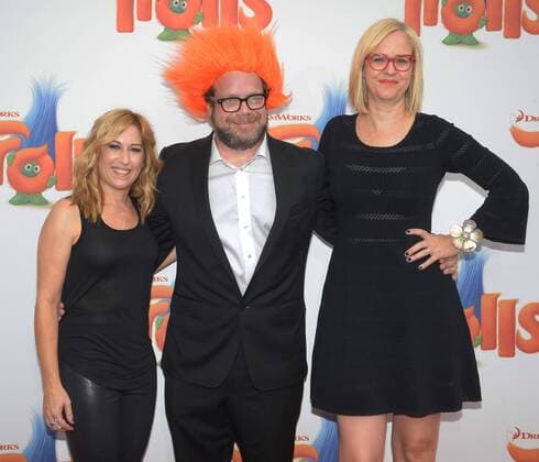 Music supervisor Julia Michels, composer Christophe Beck and music supervisor Julianne Jordan (L-R) in the animated motion picture comedy Trolls attends the premiere of the film at the Regency Village Theater in the Westwood section of Los Angeles on October 23, 2016. Storyline: A troll princess and her companion, the one unhappy troll try to rescue her friends from being eaten by their nemeses.  LAP2016102334 JIMxRUYMEN