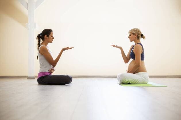 Prenatal yoga, female yoga instructor, breathing model released Symbolfoto property released  ZEDF00341