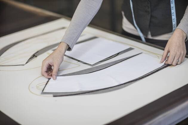Close-up of woman working on template in tailor shop model released Symbolfoto property released  ZEF10679