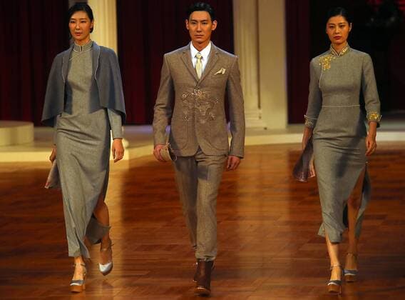 Chinese models wear clothing from the NE Tiger 2017 collection during China s international fashion week in Beijing on October 25, 2016. Chinese fashion designers are becoming an international force with both European and American fashion houses looking at the new, fresh Chinese clothing-minds as potential partners in future clothing brands.  PEK2016102506 STEPHENxSHAVER