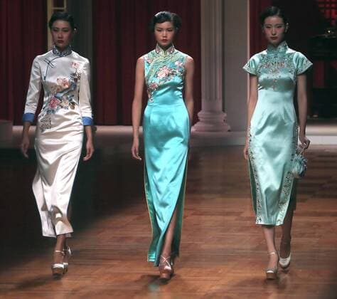 Chinese models wear clothing from the NE Tiger 2017 collection during China s international fashion week in Beijing on October 25, 2016. Chinese fashion designers are becoming an international force with both European and American fashion houses looking at the new, fresh Chinese clothing-minds as potential partners in future clothing brands.  PEK2016102513 STEPHENxSHAVER