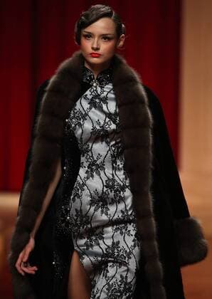 Chinese models wear clothing from the NE Tiger 2017 collection during China s international fashion week in Beijing on October 25, 2016. Chinese fashion designers are becoming an international force with both European and American fashion houses looking at the new, fresh Chinese clothing-minds as potential partners in future clothing brands.  PEK2016102519 STEPHENxSHAVER