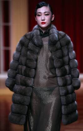 Chinese models wear clothing from the NE Tiger 2017 collection during China s international fashion week in Beijing on October 25, 2016. Chinese fashion designers are becoming an international force with both European and American fashion houses looking at the new, fresh Chinese clothing-minds as potential partners in future clothing brands.  PEK2016102520 STEPHENxSHAVER