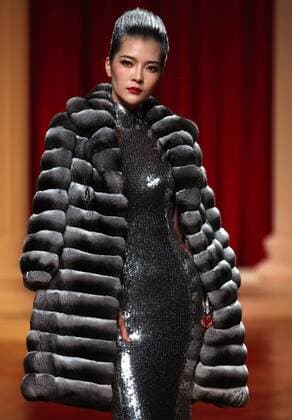 Chinese models wear clothing from the NE Tiger 2017 collection during China s international fashion week in Beijing on October 25, 2016. Chinese fashion designers are becoming an international force with both European and American fashion houses looking at the new, fresh Chinese clothing-minds as potential partners in future clothing brands.  PEK2016102521 STEPHENxSHAVER