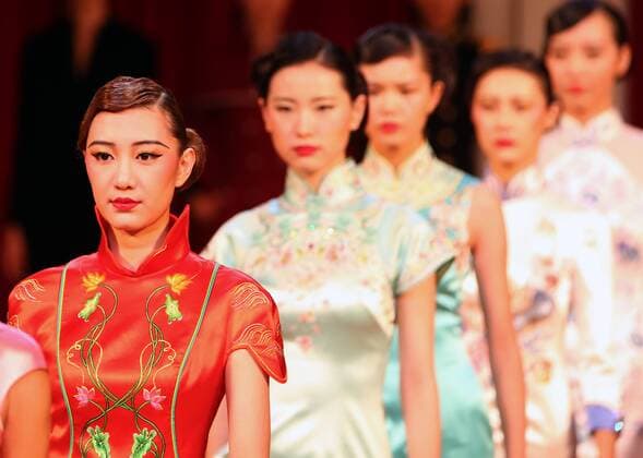 Chinese models wear clothing from the NE Tiger 2017 collection during China s international fashion week in Beijing on October 25, 2016. Chinese fashion designers are becoming an international force with both European and American fashion houses looking at the new, fresh Chinese clothing-minds as potential partners in future clothing brands.  PEK2016102522 STEPHENxSHAVER
