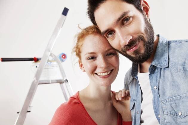 Portrait of smiling young couple during renovation model released Symbolfoto property released  MFF003273
