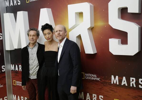 Brian Grazer, Jihae and Ron Howard arrive on the red carpet at the National Geographic Channel MARS New York Premiere on October 26, 2016 in New York City  NYP20161026130 JOHNxANGELILLO