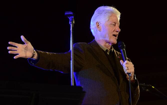 President Bill Clinton surprises the fans of Jon Bon Jovi by arriving at the end of his performance at a pro-Hillary Clinton concert at the Soldiers & Sailors Memorial Hall and Museum in Oakland area of Pittsburgh on October 27, 2016.  PIT2016102703 ARCHIExCARPENTER