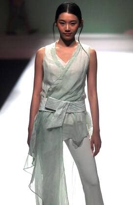 Chinese models wear clothing from the Chuyun 2017 collection during China s international fashion week in Beijing on October 28, 2016. Chinese fashion designers are becoming an international force with both European and American fashion houses looking at the new, fresh Chinese clothing-minds as potential partners in future clothing brands.  PEK2016102810 STEPHENxSHAVER