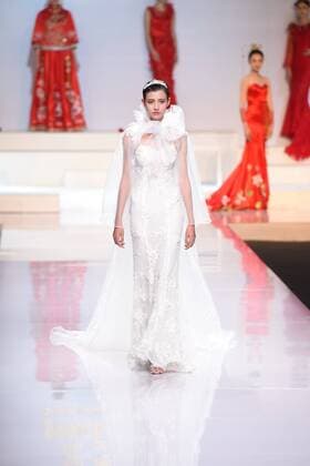 October 27, 2016 - Beijing, Beijing, China - Beijing,CHINA-October 27 2016: (EDITORIAL USE ONLY. CHINA OUT) ..A model shows a wedding dress of designer Tsaim Meiyue s collections at China Fashion Week in Beijing, October 27th, 2016. Beijing China  - ZUMAs145 20161027_zaa_s145_138