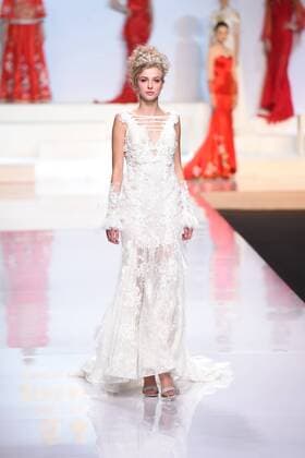 October 27, 2016 - Beijing, Beijing, China - Beijing,CHINA-October 27 2016: (EDITORIAL USE ONLY. CHINA OUT) ..A model shows a wedding dress of designer Tsaim Meiyue s collections at China Fashion Week in Beijing, October 27th, 2016. Beijing China  - ZUMAs145 20161027_zaa_s145_143
