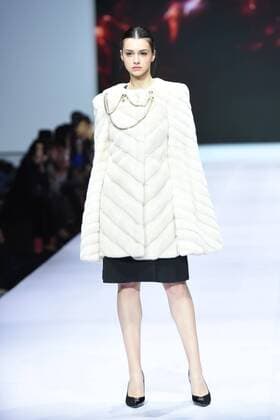 October 28, 2016 - Beijing, Beijing, China - Beijing,CHINA-October 28 2016: (EDITORIAL USE ONLY. CHINA OUT) ..A model presents a creation of the online shopping platform 10fur.com at China Fashion Week (S S 2017) in Beijing, October 28th, 2016. Beijing China  - ZUMAs145 20161028_zaa_s145_067
