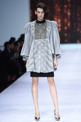 October 28, 2016 - Beijing, Beijing, China - Beijing,CHINA-October 28 2016: (EDITORIAL USE ONLY. CHINA OUT) ..A model presents a creation of the online shopping platform 10fur.com at China Fashion Week (S S 2017) in Beijing, October 28th, 2016. Beijing China  - ZUMAs145 20161028_zaa_s145_074