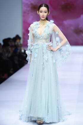 October 28, 2016 - Beijing, Beijing, China - Beijing,CHINA-October 28 2016: (EDITORIAL USE ONLY. CHINA OUT) ..A model presents a creation of the online shopping platform 10fur.com at China Fashion Week (S S 2017) in Beijing, October 28th, 2016. Beijing China  - ZUMAs145 20161028_zaa_s145_092